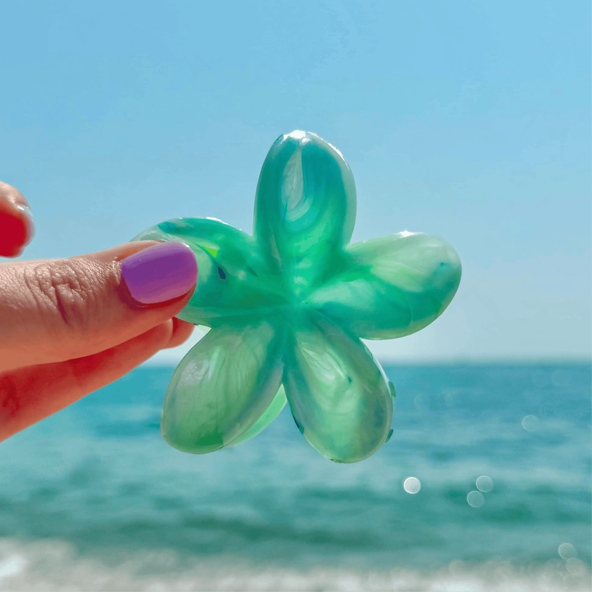 Pinza hibisco azul