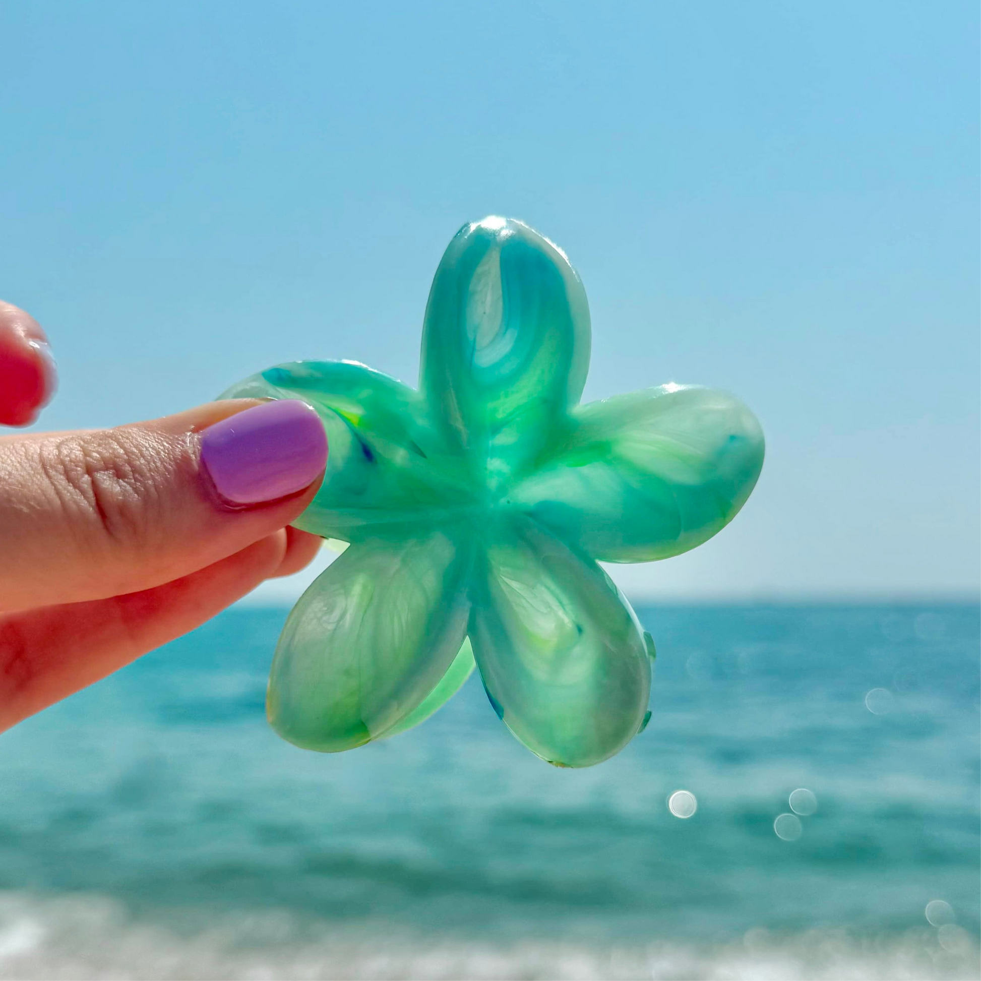 Pinza hibisco azul